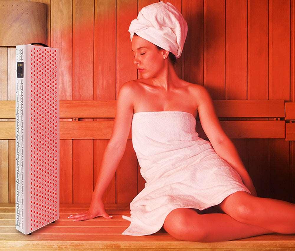 YOULUMI Red Light Therapy Panel use in sauna setting, promoting wellness and pain relief