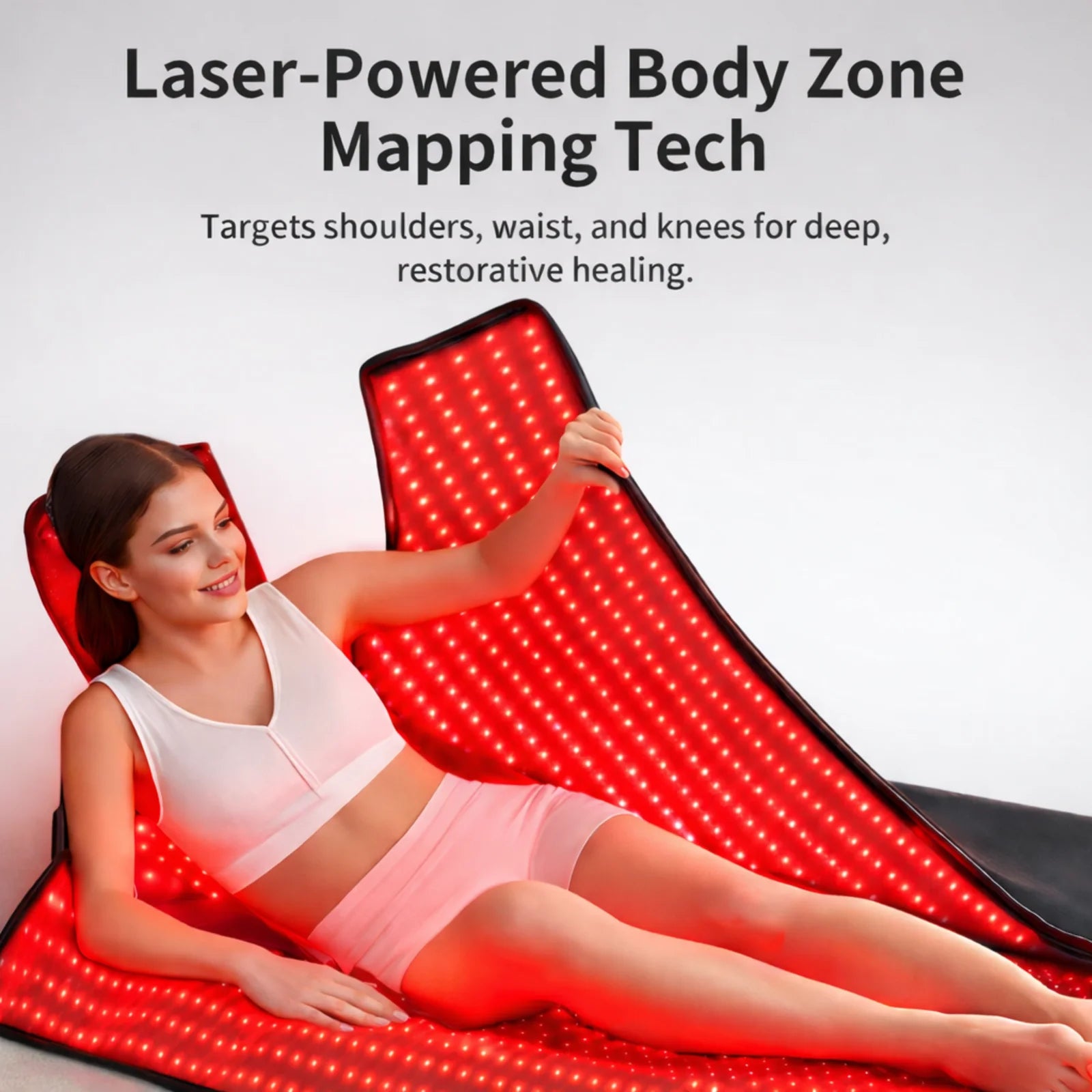 Alt: Laser + LED sleep bag lifestyle image with body zone mapping design targeting shoulders, waist, and knees.