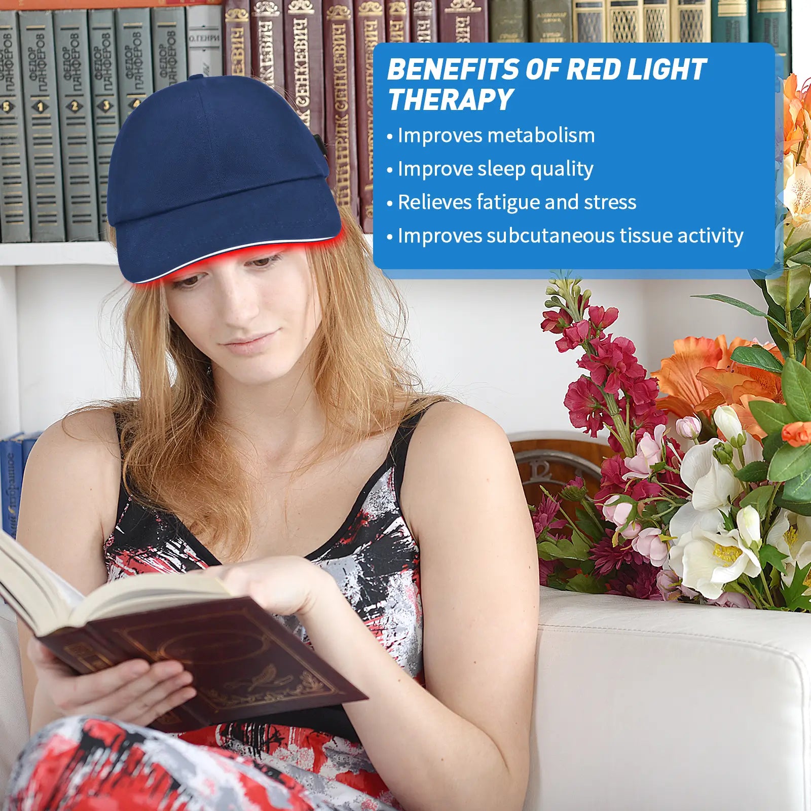 Woman wearing a red light therapy cap while reading, promoting hair growth and scalp health.