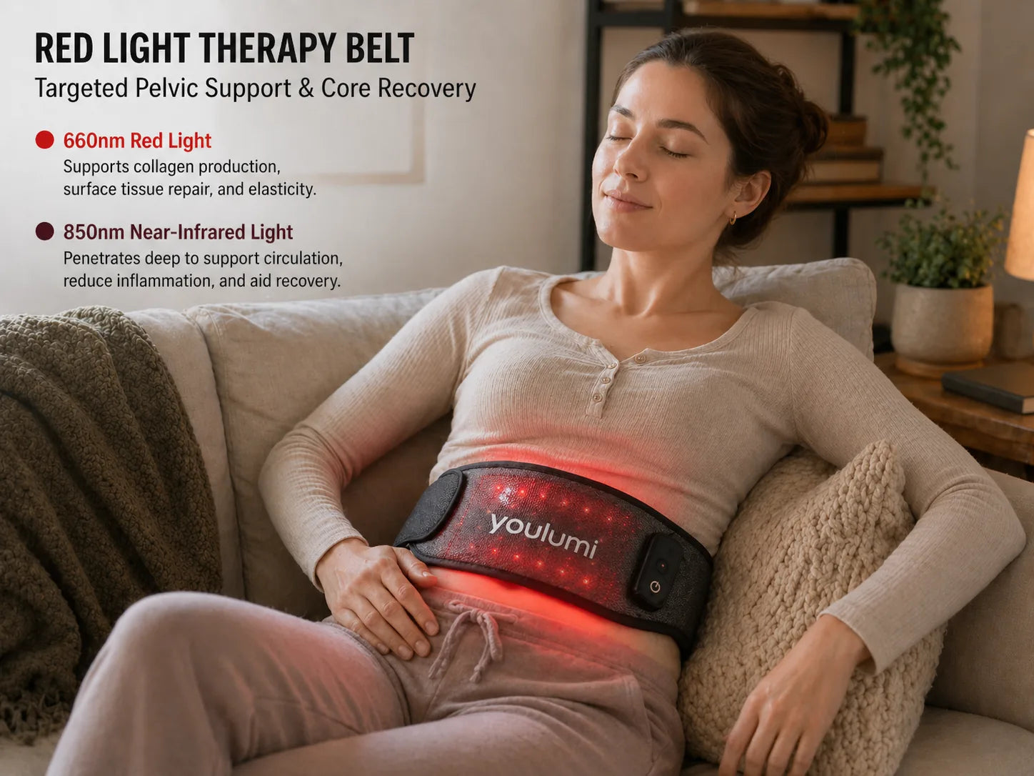 A person using a red light therapy belt over the lower abdomen while resting at home