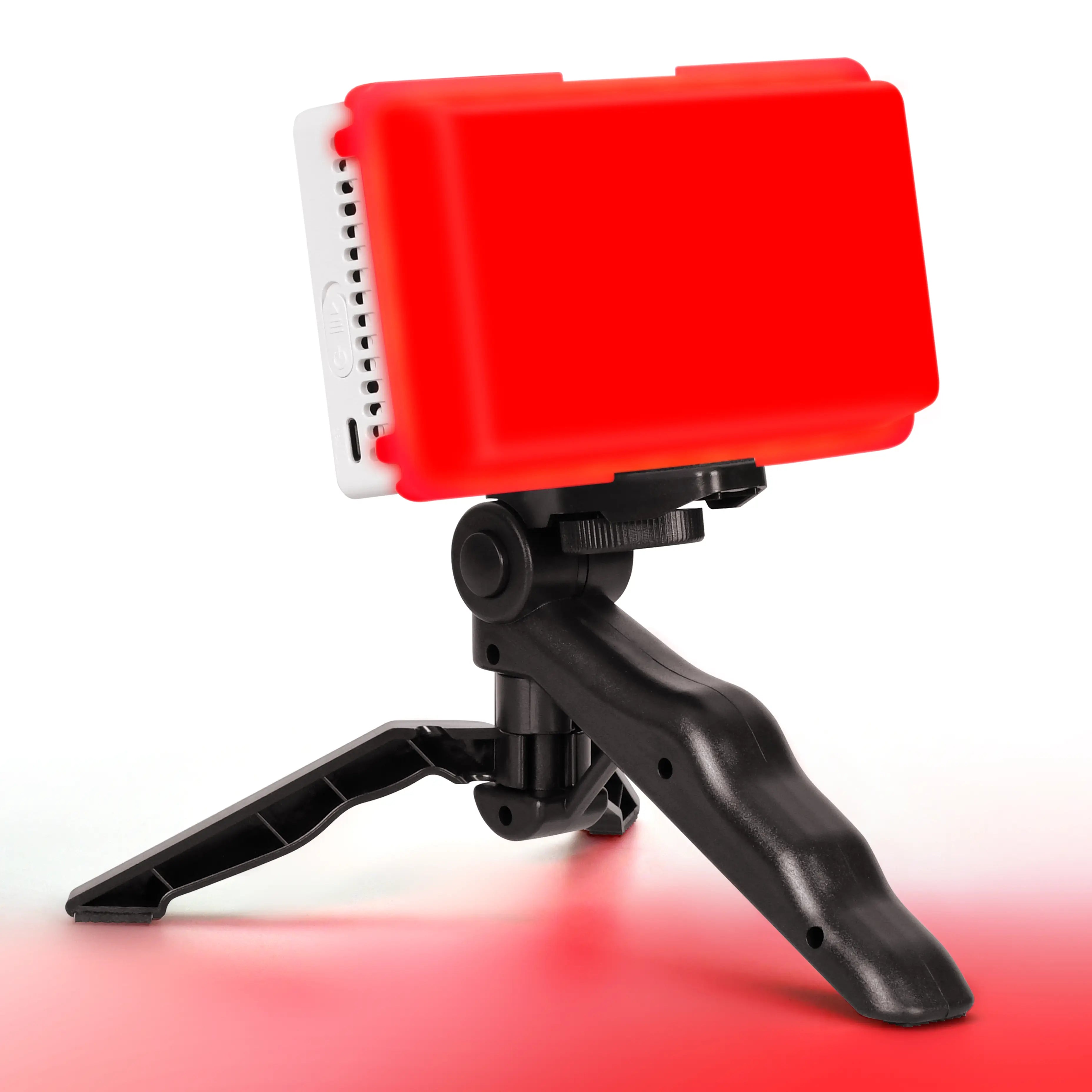Mini red light therapy panel with soft diffuser and tripod stand for flexible use