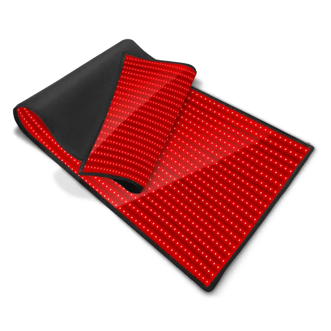 Angled view of a partially folded red light therapy mat with glowing LEDs