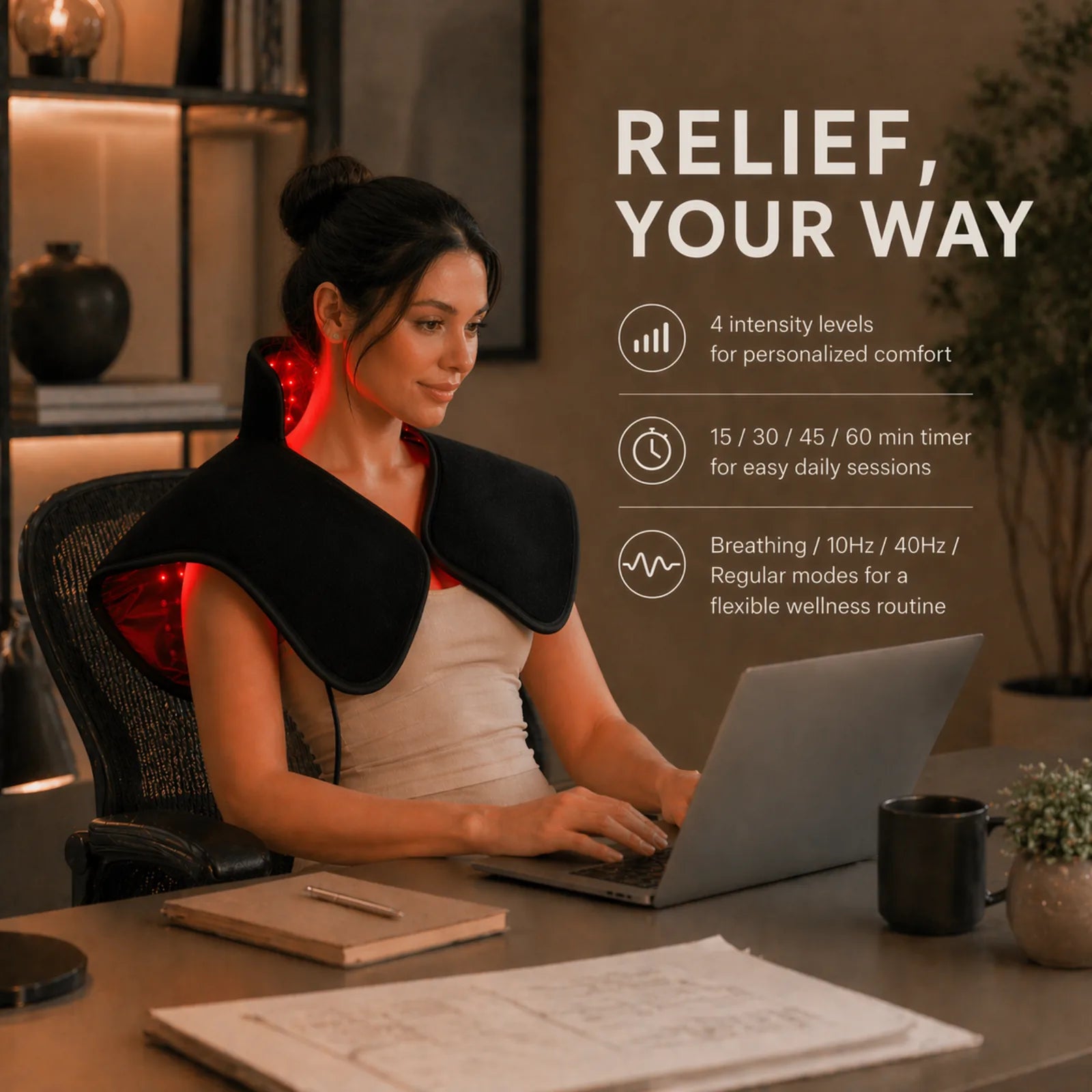 Woman using a red light therapy shoulder wrap while working for personalized neck and shoulder comfort